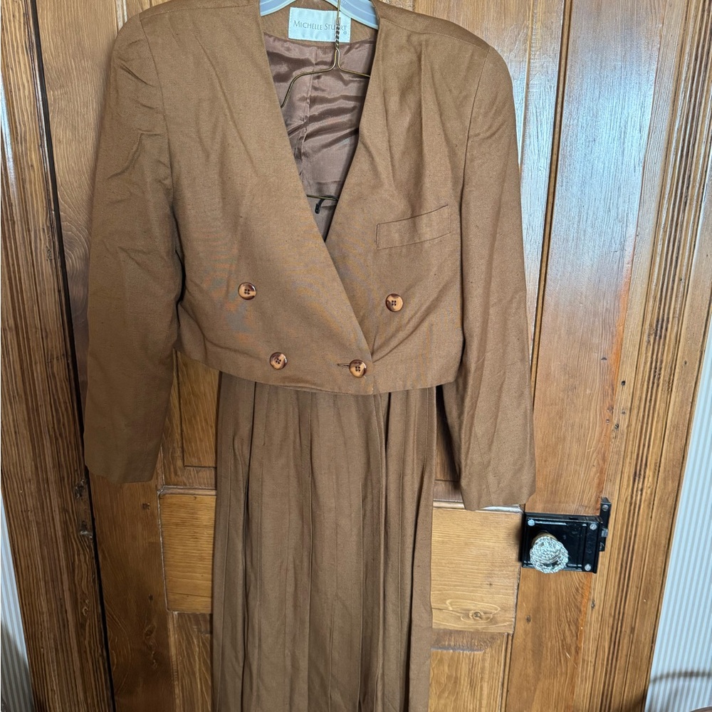 Michelle Stuart Brown Tailored Jacket with matching pleated skirt.